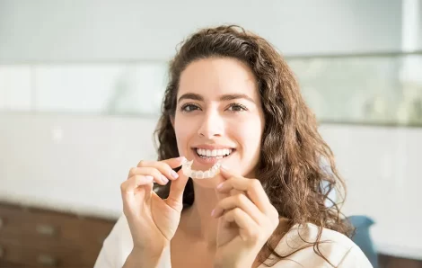 Are Custom Invisalign Aligners Really More Effective Than Braces?